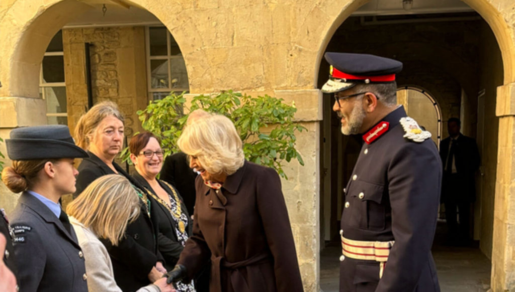 Queen Camilla and The Lord Lieutenant greeting visitors