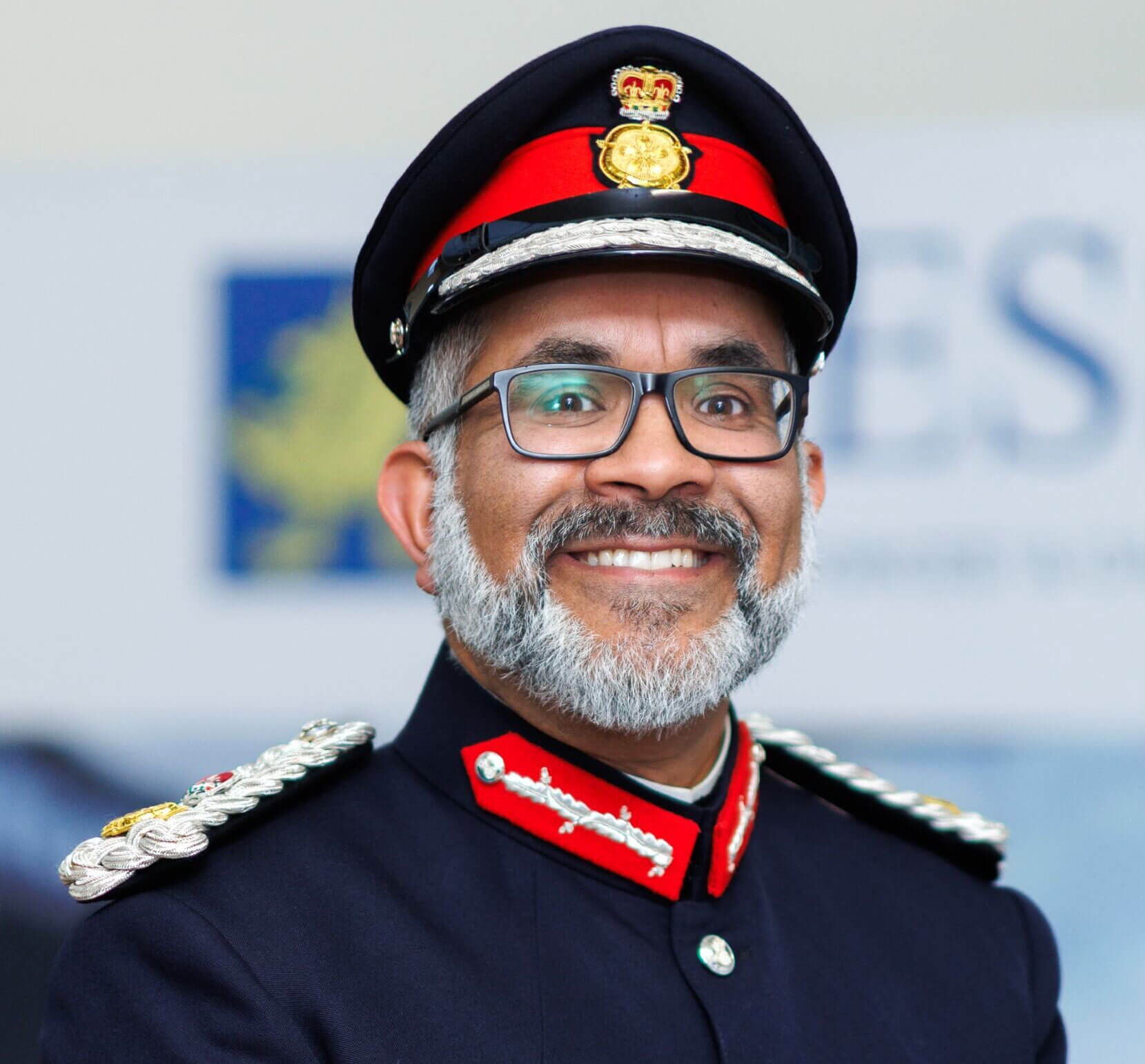 Portrait image of Mohammed Saddiq, the Lord-Lieutenant of Somerset in his official uniform and hat.