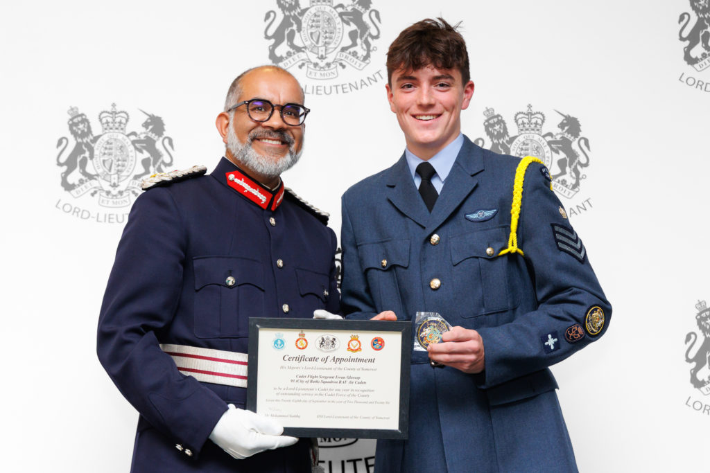 Flight Sergeant Ewan Glossop receiving his certificate from the Lord-Lieutenant of Somerset.