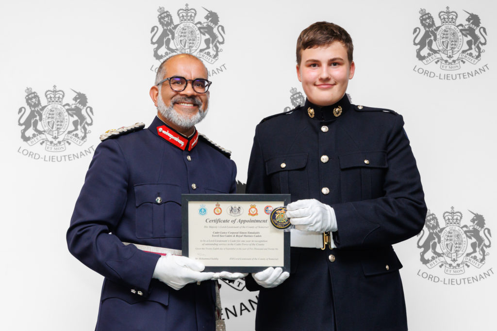 Lance Corporal Simon Simukaitis receiving his certificate from the Lord-Lieutenant of Somerset.