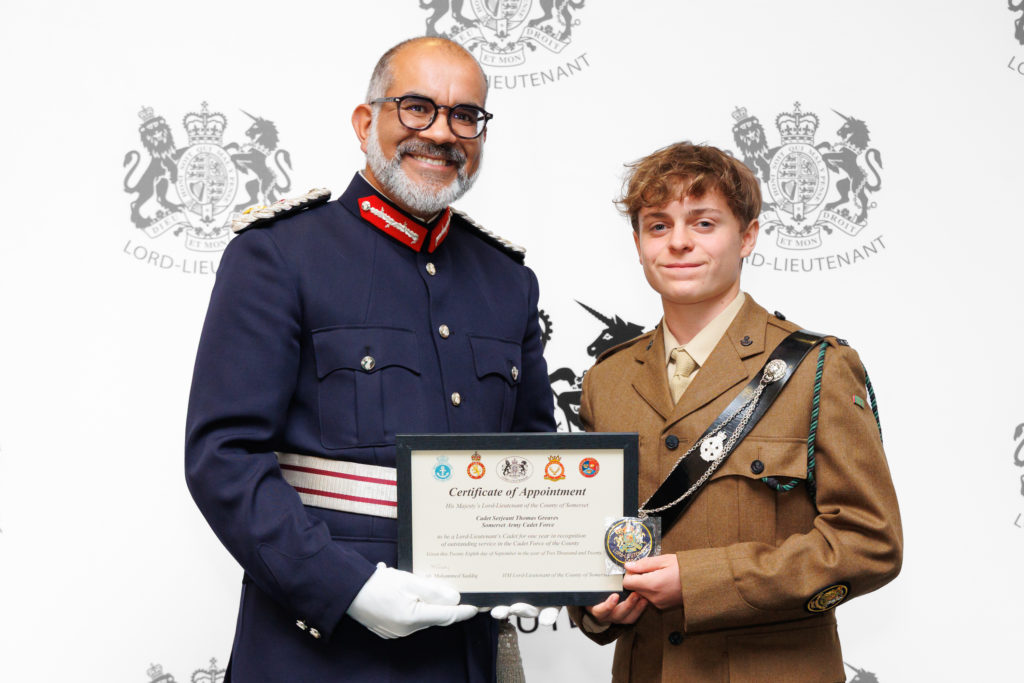 Sergeant Thomas Greaves receiving his certificate from the Lord-Lieutenant of Somerset.